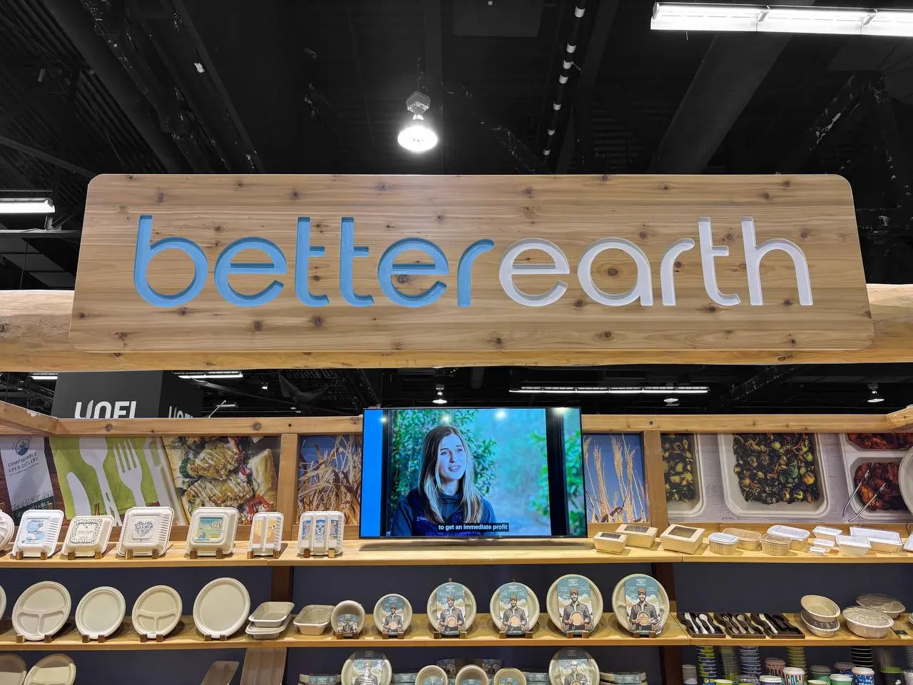 Better Earth product shelving with digital screen